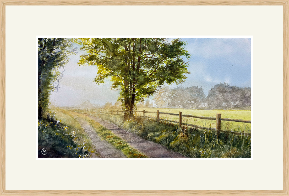 Framed artwork of a landscape with a path, trees, and a fence.
