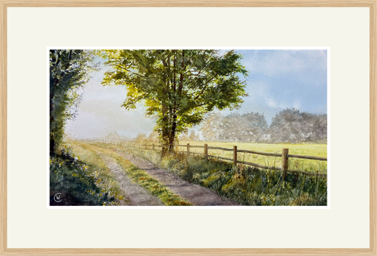 Framed artwork of a landscape with a path, trees, and a fence.
